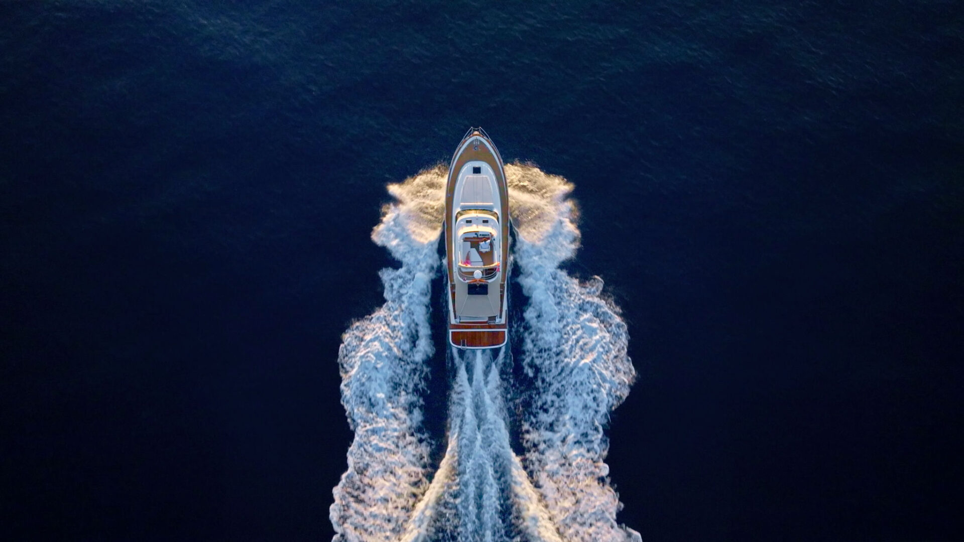 Aerial view of boat on open water.