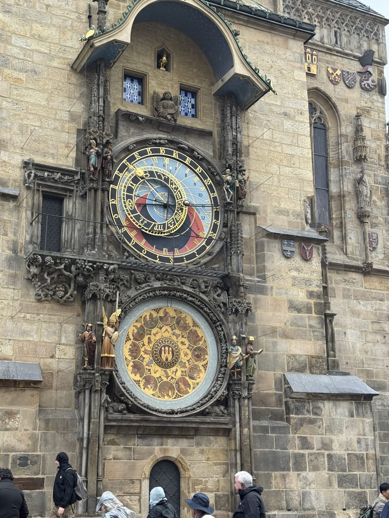 The Prague astronomical clock on a historic stone tower.
